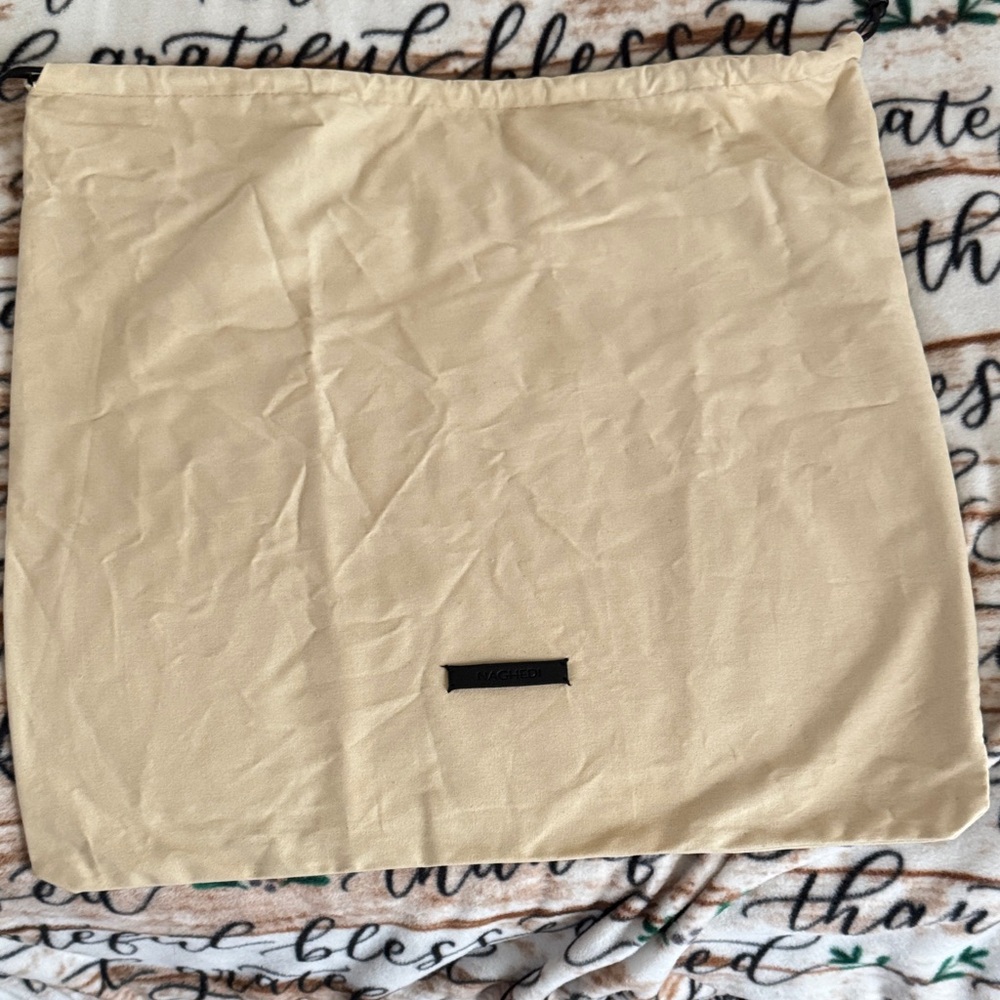 Naghedi 19”x17.5” branded dust bag. New never used condition.